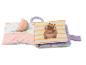 Livre d'activités en tissu pour bébé avec un hippopotame et une pastèque.