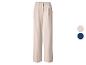 Beige geplooide damesbroek met kleurkeuzes.