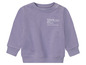Pull à manches longues violet avec l'inscription 'future'