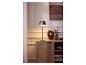 LIVARNO home LED-accutafellamp op een houten dressoir.