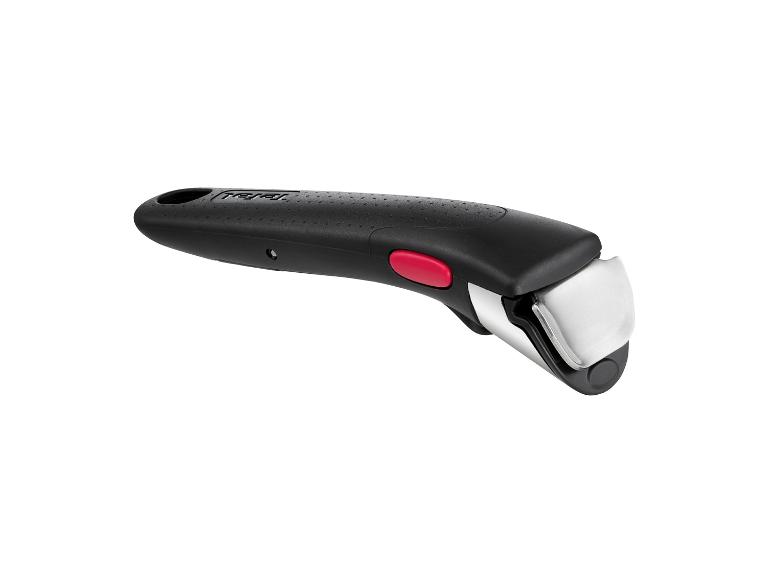 Une poignée Tefal noire avec un bouton rouge.