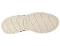 Beige sportzool met ruitpatroon en gebogen lijnen.