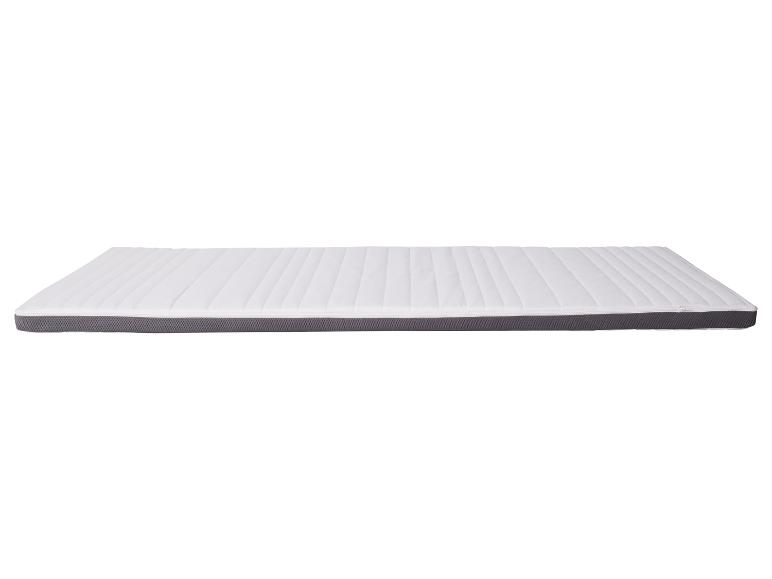 Matelas simple blanc et gris.