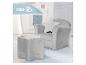 Fauteuil et pouf gris pour enfants avec un coussin en forme d'étoile dans une chambre d'enfant, marque Roba.