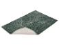Donkergroene badmat met een opstaande rand die de antislip onderkant toont.
