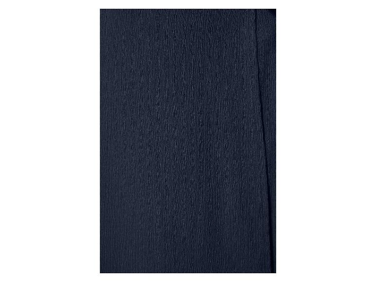 Un tissu bleu foncé avec une texture.