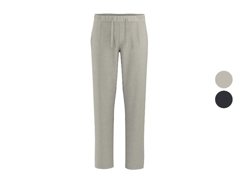 Pantalon en lin pour homme beige clair avec cordon de serrage ajustable, également disponible en noir.