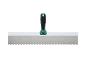 Spatule crantée pour colle à carrelage avec manche vert et noir