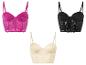 Trois bustiers en dentelle rose, noir et crème.