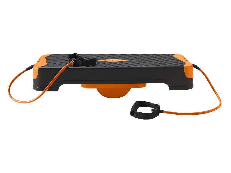 Plateforme d'exercice noire et orange avec bandes de résistance