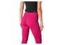 Roze leggings en zwart topje, sportkleding.