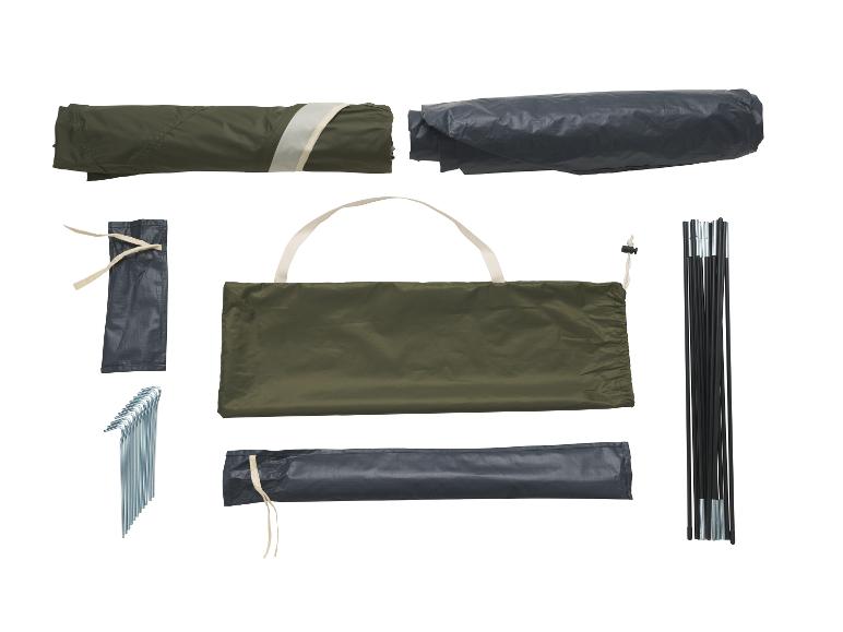Équipement de camping : tente pliée, piquets et arceaux.