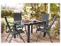 Tuinset: antracietgrijze metalen tafel en opvouwbare stoelen.