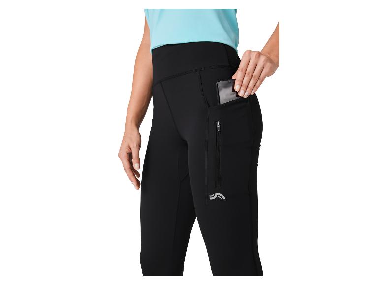 Zwarte sportleggings met ritszakken.
