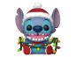 Funko Pop! Stitch de Noël avec bonnet de Père Noël et guirlande lumineuse.