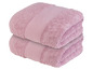 Twee roze handdoeken gestapeld.