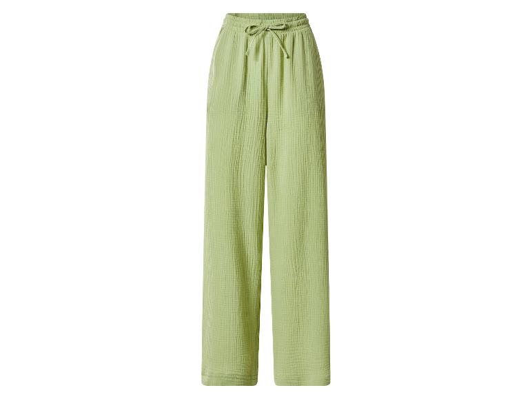 Pantalon large en mousseline verte avec cordon de serrage à la taille.