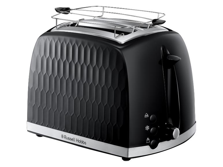 Grille-pain noir avec corps texturé et accents métalliques, doté d'une grille chauffe-viennoiseries.