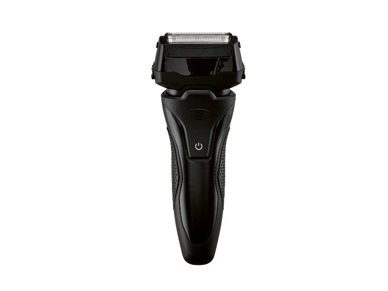 Rasoir électrique noir avec un bouton marche/arrêt visible.