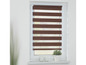 Bruine zebra blinds op een wit raam