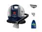 BISSELL SpotClean Mini draagbare vlekkenreiniger met accessoires en reinigingsoplossing.