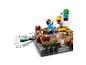 Ensemble de blocs de construction avec figurines, poulet et zombie, avec mécanisme de tir.