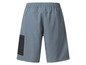 Blauwe sportbroek met een zwart zakje.
