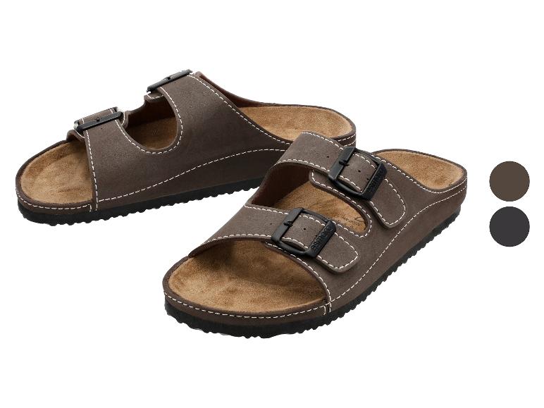 Sandales marron à deux brides avec boucles noires, surpiqûres blanches.