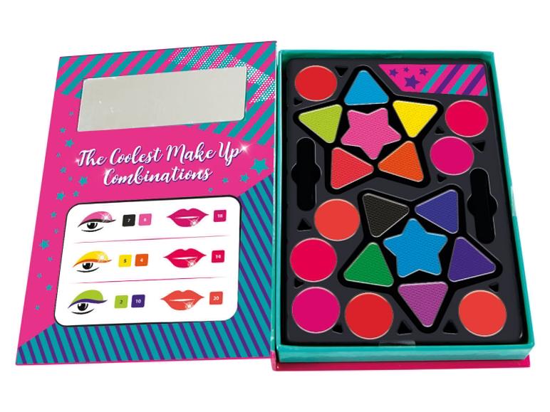 Un kit de maquillage avec des ombres à paupières, du rouge à lèvres et un miroir.