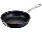 Une poêle noire avec une large surface et un manche argenté de la marque Jamie Oliver Tefal.