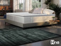 Matelas Hno sur un sommier avec des oreillers.