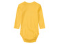 Un body bébé jaune à manches longues.