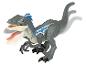 Une figurine de jouet de velociraptor grise avec des détails bleus.
