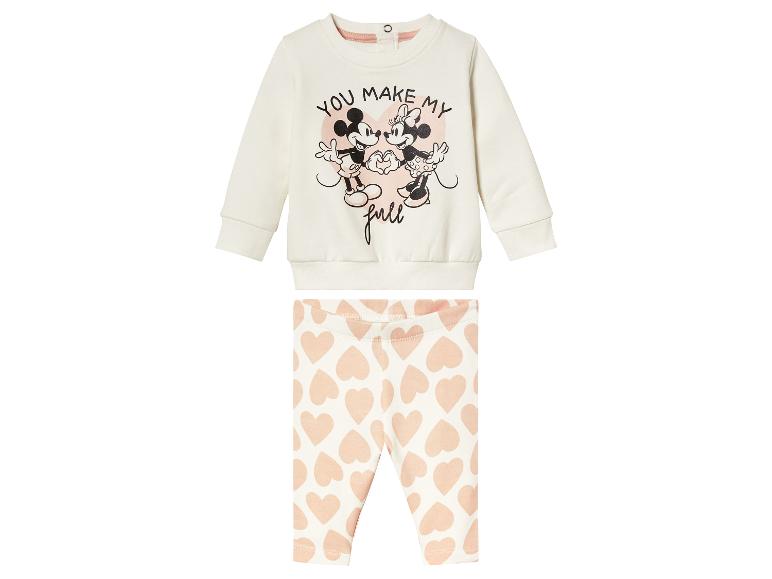 Mickey Mouse sweatshirt met hartjesprint en roze leggings met hartjesprint.