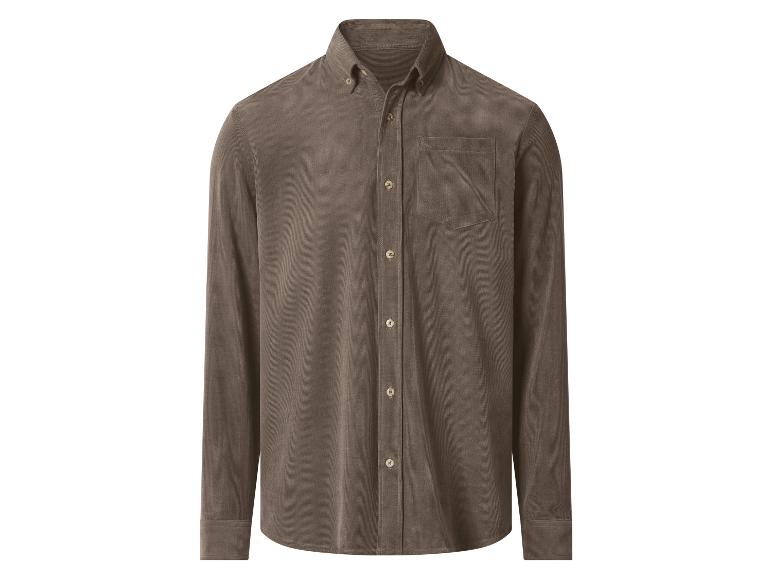 Chemise en velours côtelé marron avec boutons et poche poitrine.