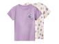 Deux t-shirts à manches courtes, un violet avec une poche florale, un crème à fleurs violettes et roses.