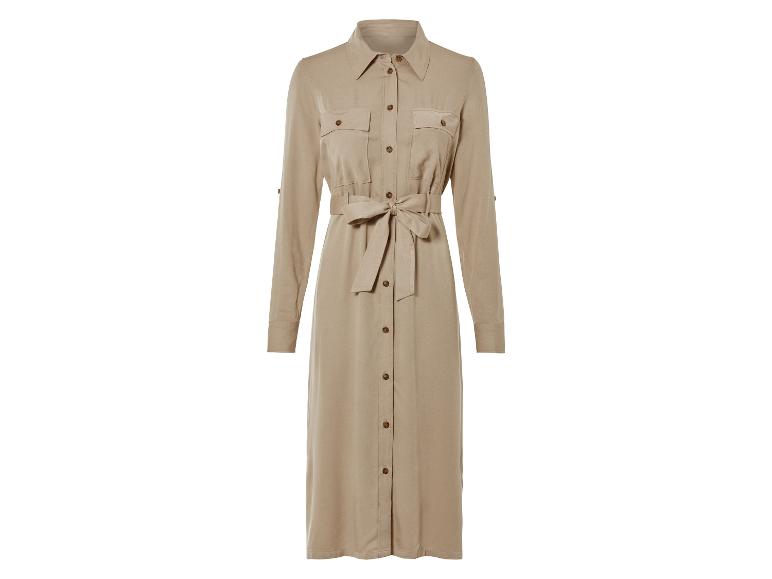 Beige getailleerde jurk met knopen en lange mouwen.