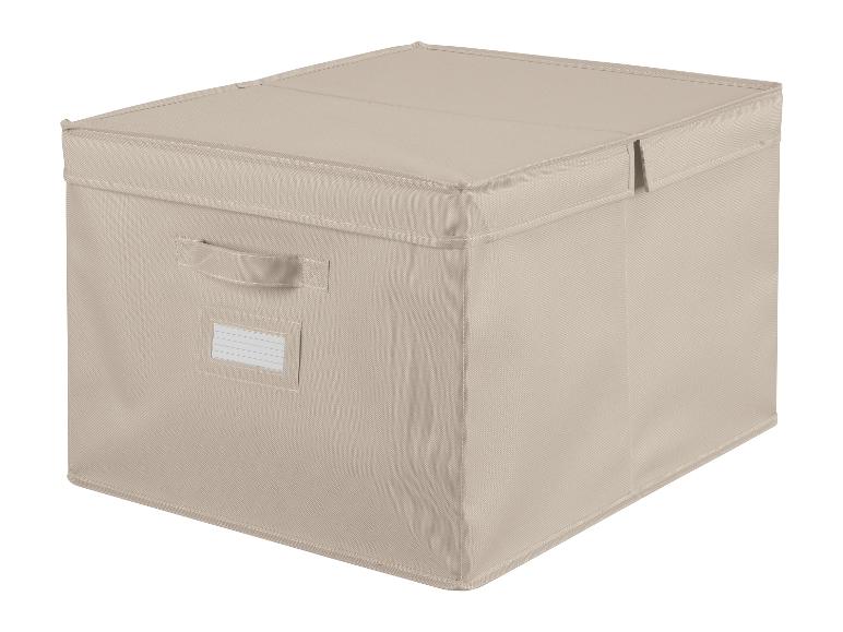 Boîte de rangement beige avec poignée et étiquette