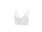 Dames sport crop top in gebroken wit, met dunne, verstelbare bandjes.