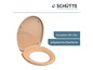 Een beige toiletbril van het merk Schütte.
