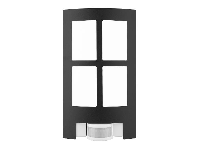 Lampe extérieure noire avec détecteur de mouvement et quatre verres carrés.