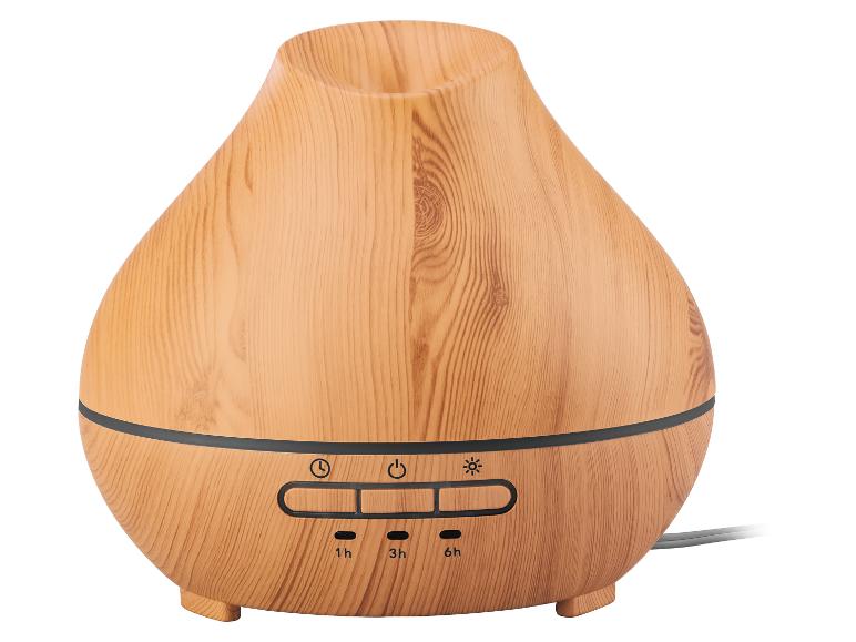 Diffuseur d'huiles essentielles en bois clair avec boutons de commande