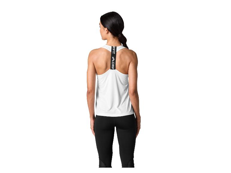 Femme en débardeur de sport blanc CRIVIT et leggings noirs, vue arrière.