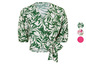 Een witte blouse met groene bladerenprint en een strik.