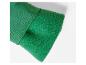 Detail van de mouw van een groen jasje met dubbel gelaagd materiaal.