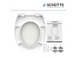 Een witte toiletbril van Schütte met slow-close functie en montagehandleiding.