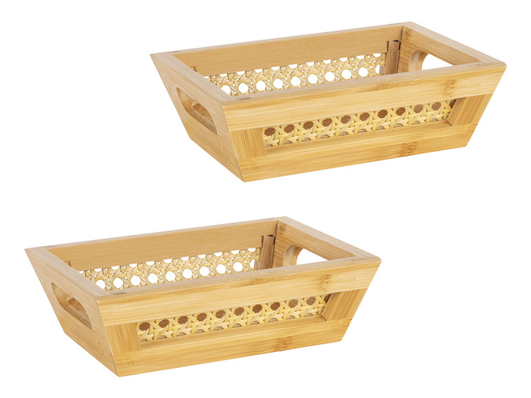 Deux paniers en bois avec un intérieur tressé.