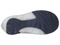 De onderkant van een blauwe sneaker met witte zool.