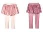 Deux paires de leggings-jupes pour enfants, un rose clair avec imprimé arc-en-ciel, un rose foncé avec des sequins floraux.