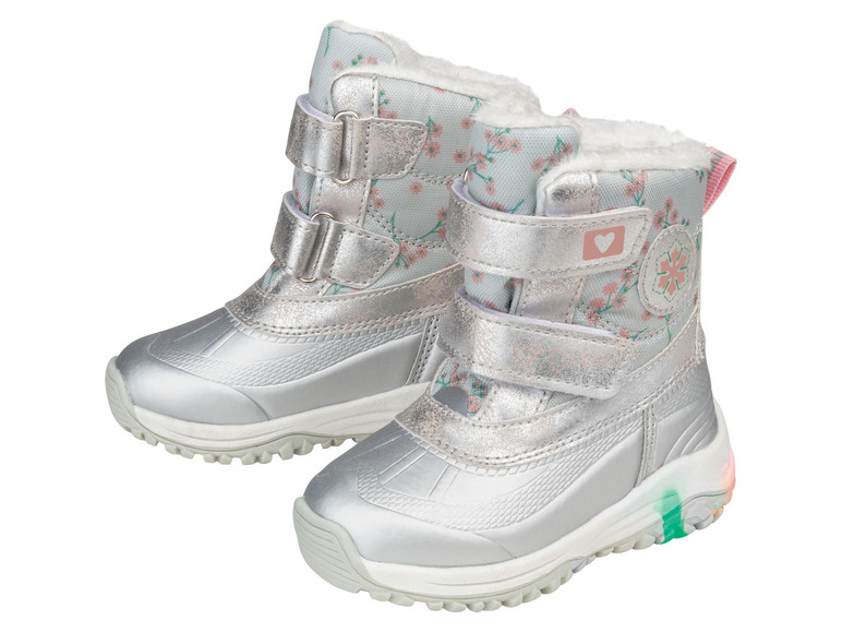 Deux paires de bottes d'hiver argentées à imprimé floral pour filles.